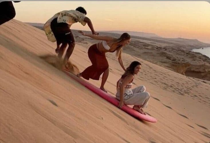 Sandboarding in Timlalin Dunes